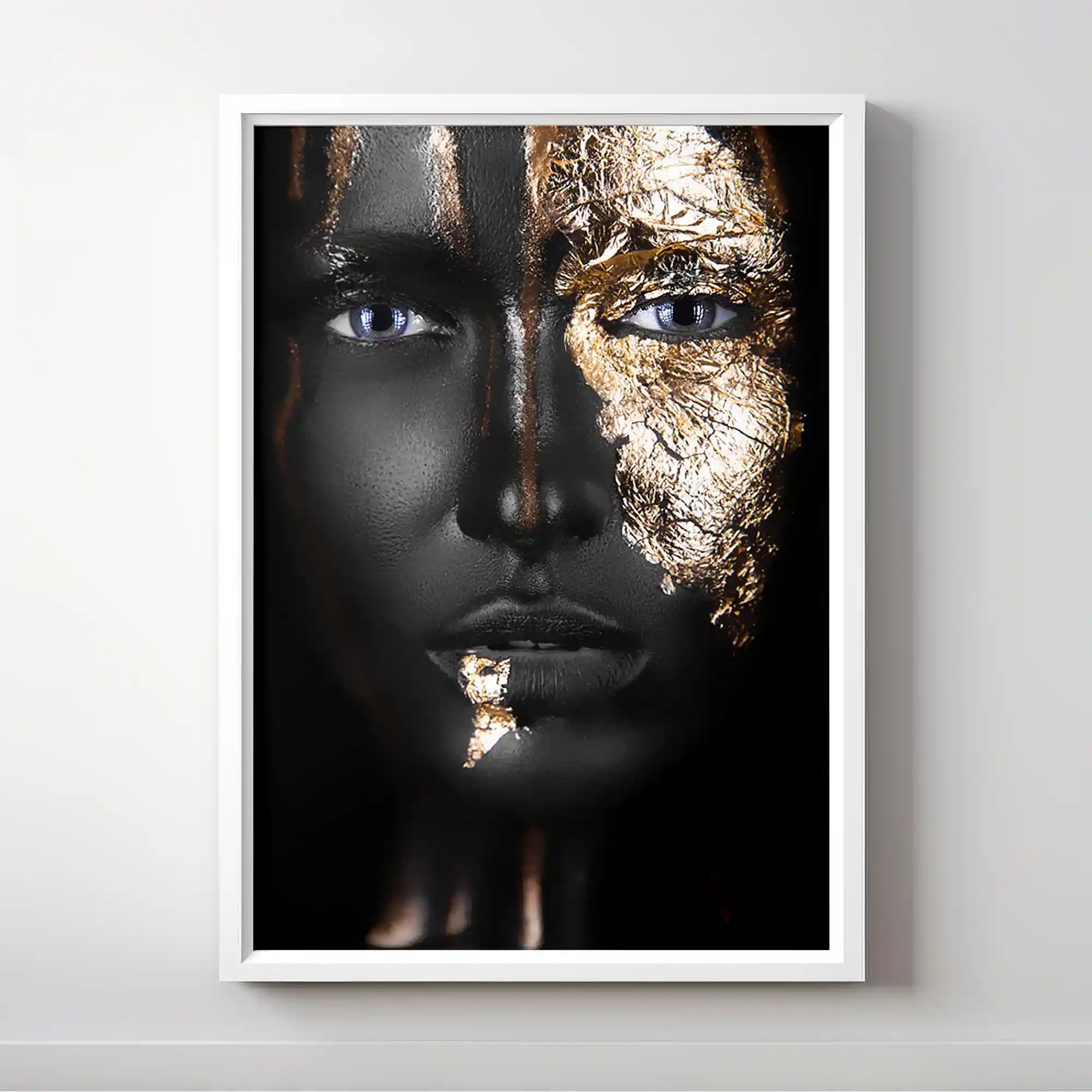 Abstract portrait of a woman with gold lips and nails.