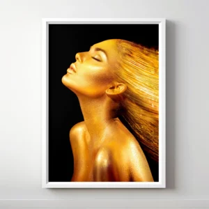 Abstract portrait of a woman with gold body paint and flowing hair.