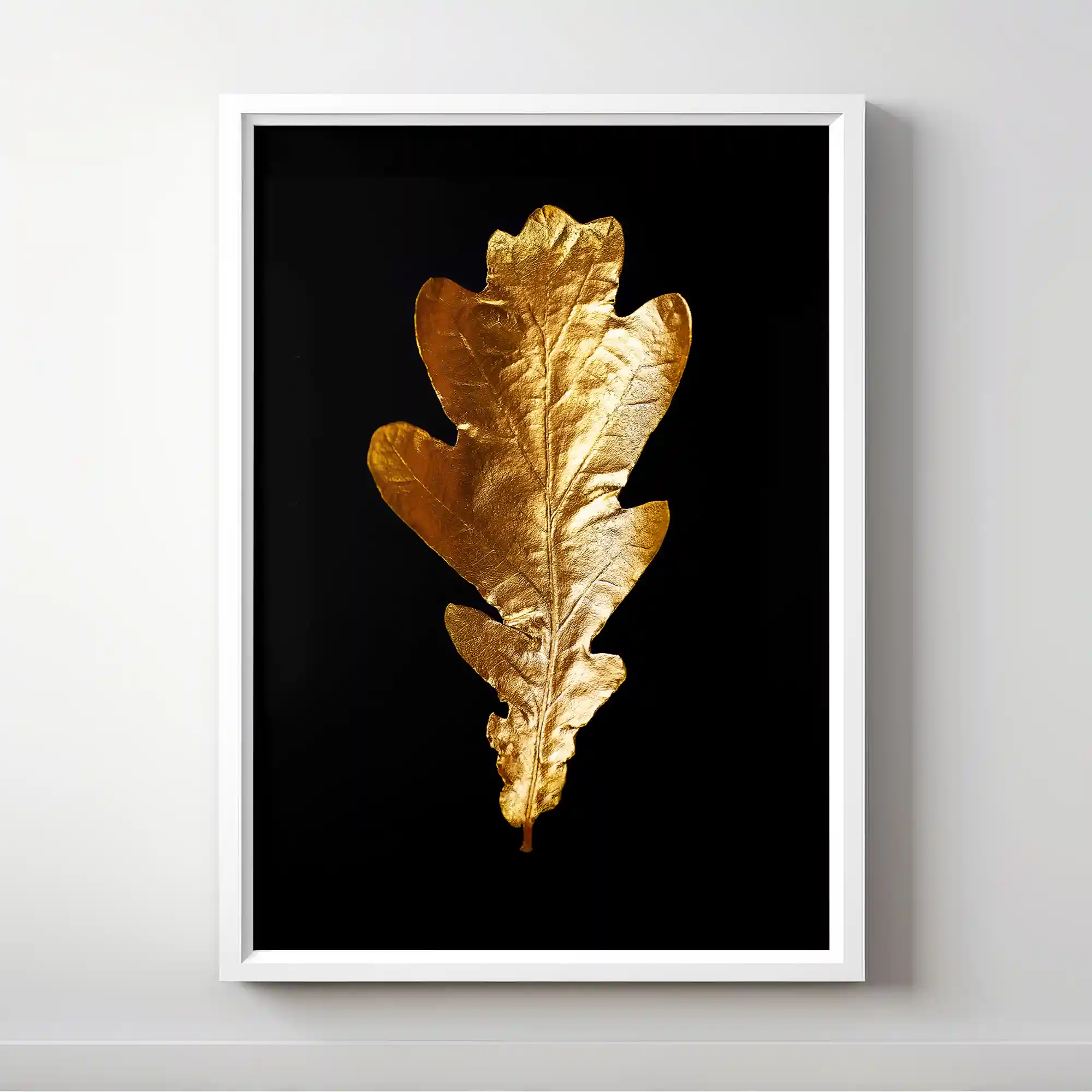 Abstract image of gold leaves on a black background.