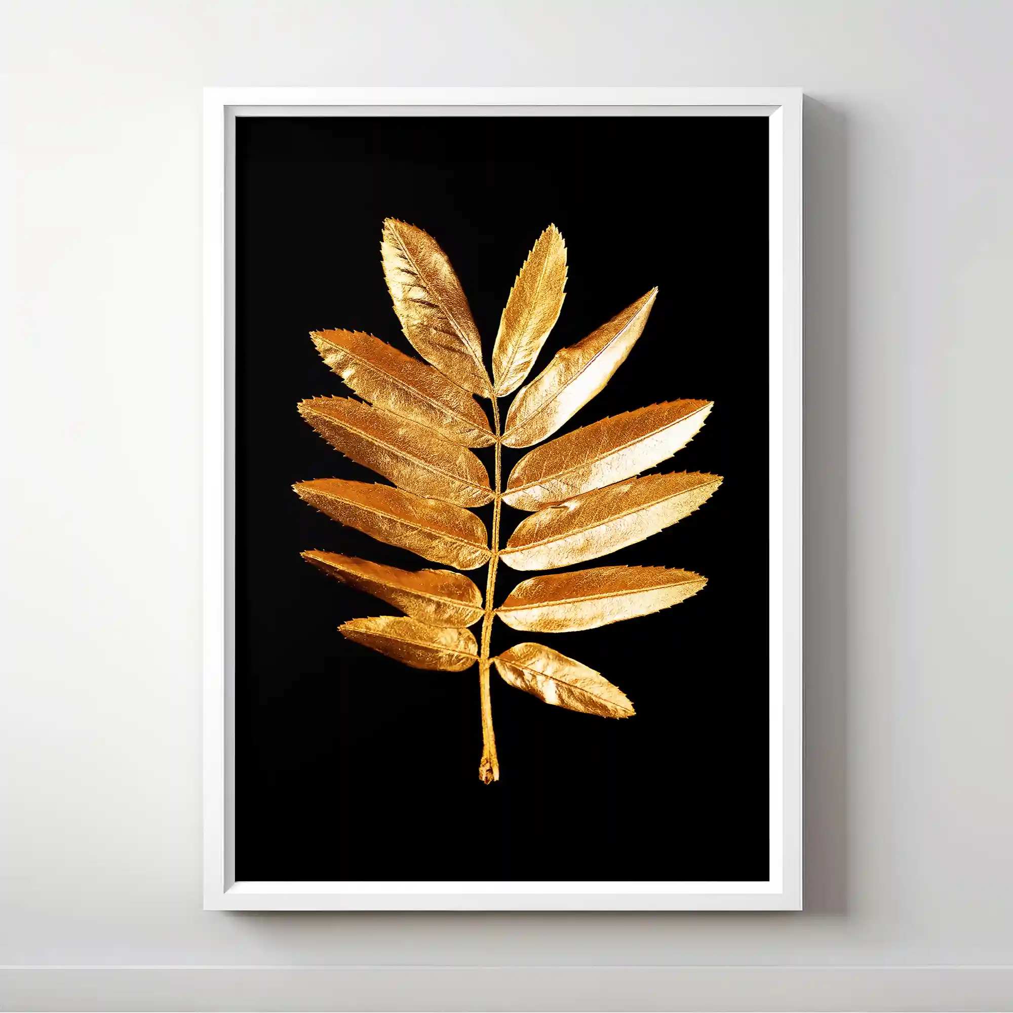 Abstract image of a gold fern leaf on a black background.