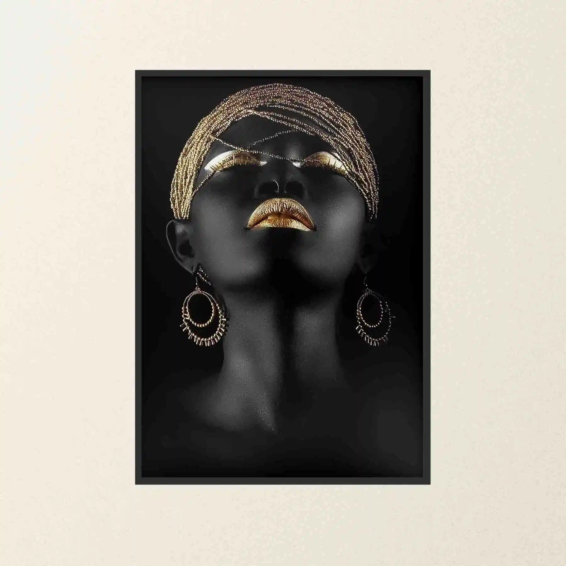 Abstract portrait of a woman with gold earrings and accents.