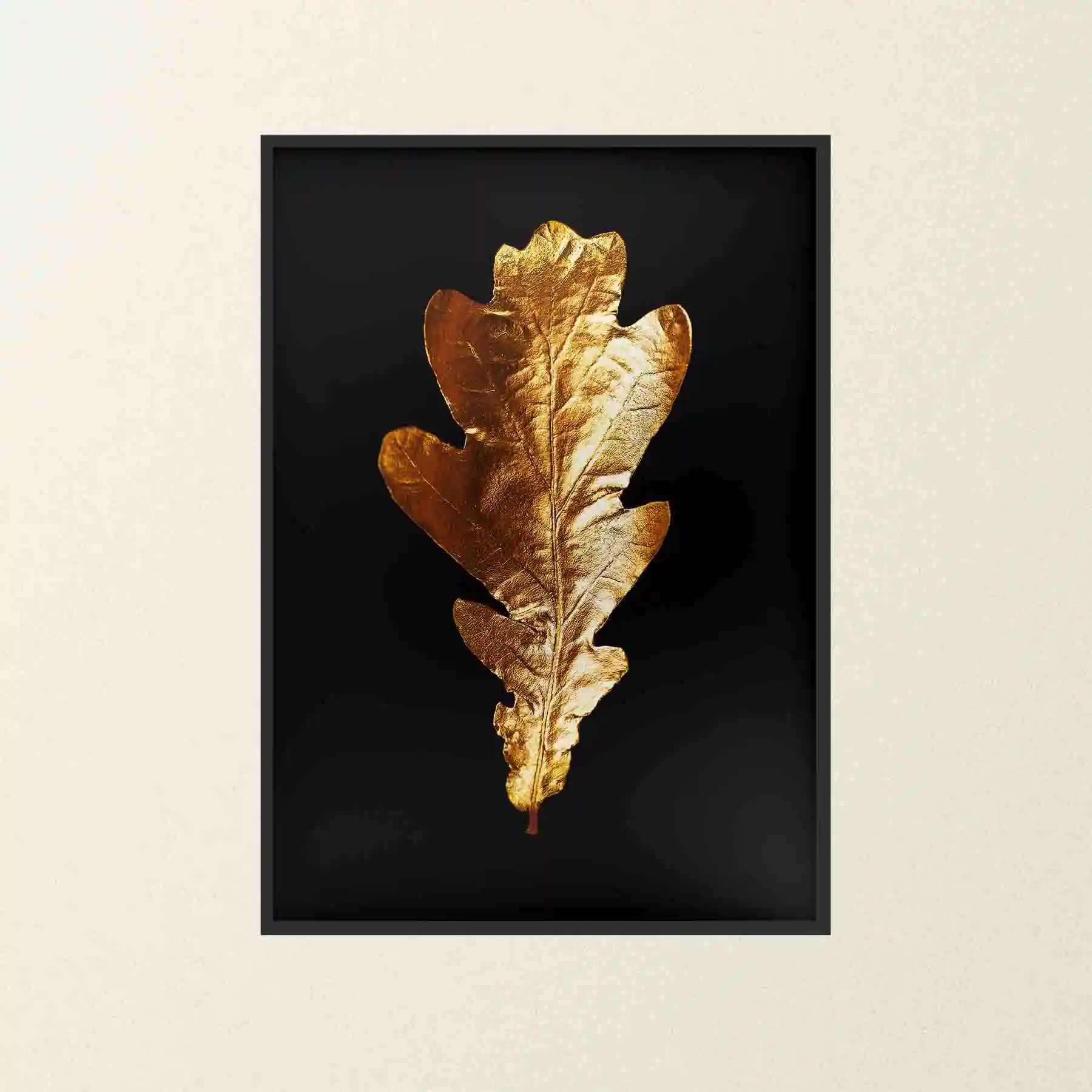 Abstract image of gold leaves on a black background.