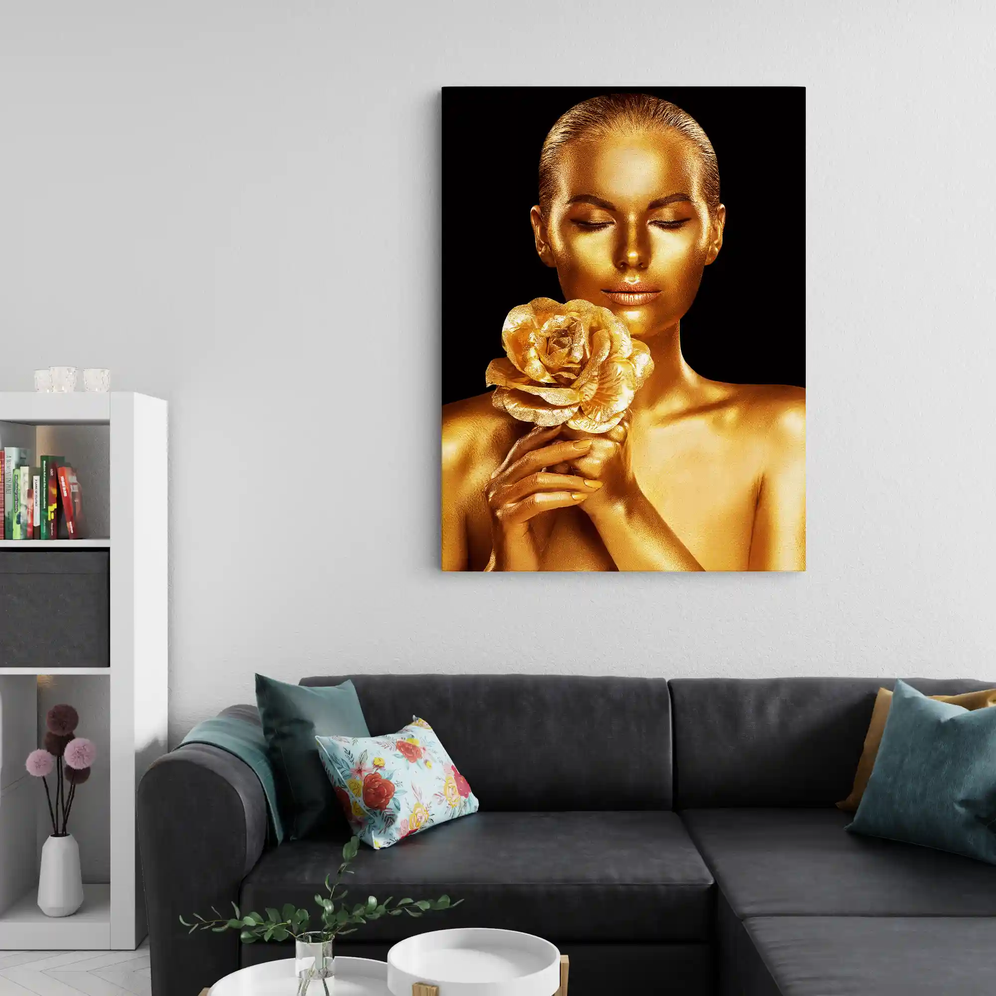 Abstract portrait of a woman with gold body paint and golden rose.