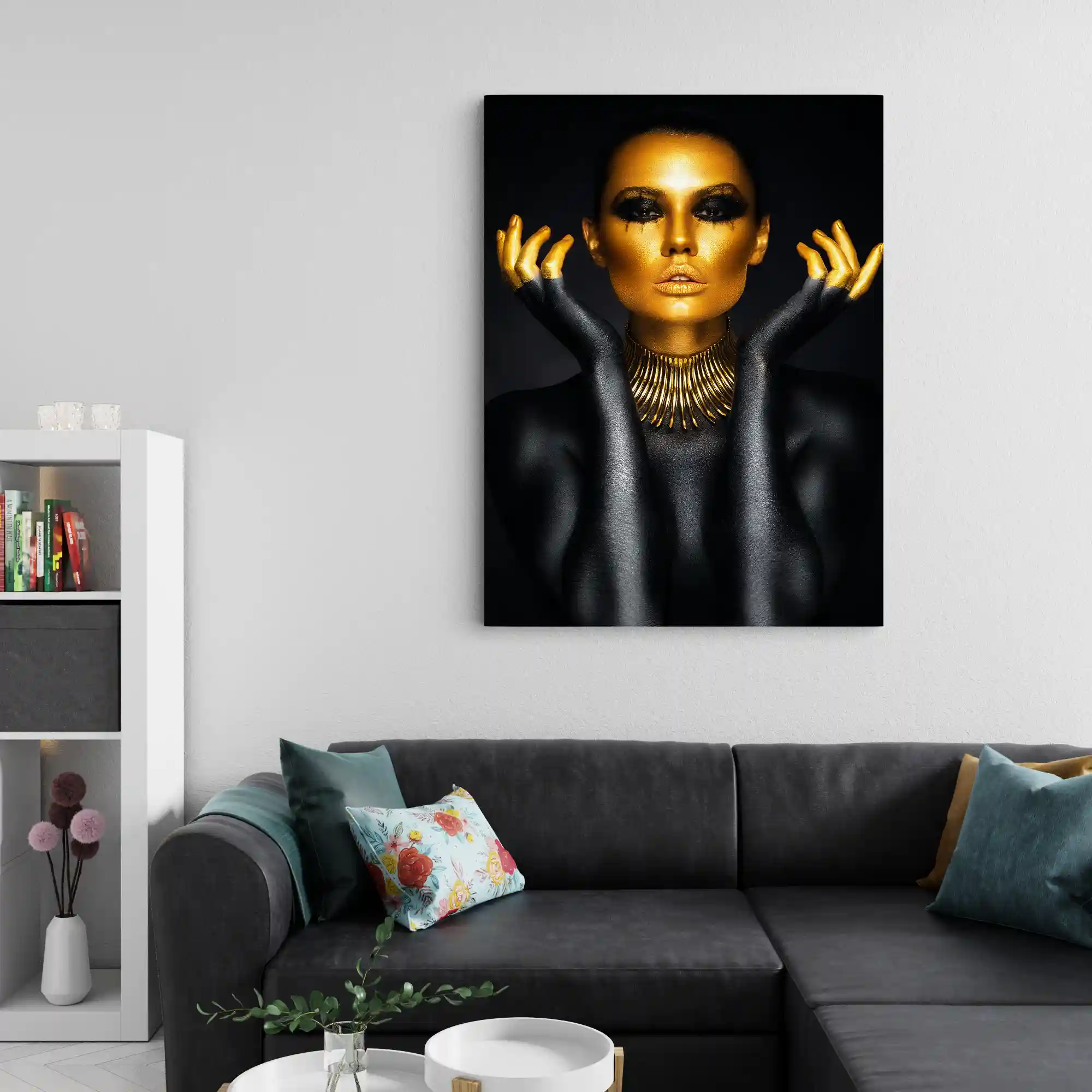 Abstract portrait of a woman with gold body paint and jewelry.