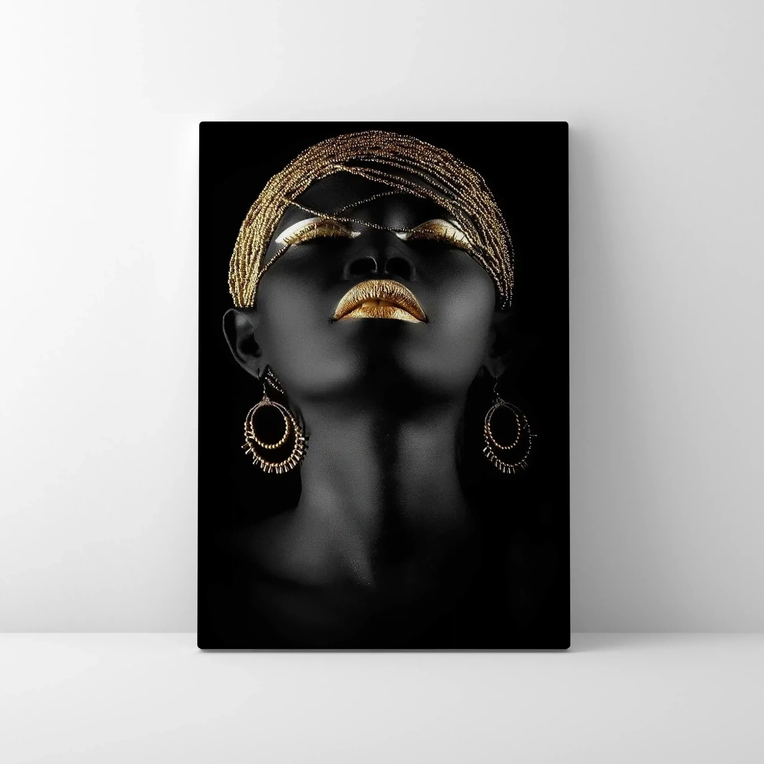 Abstract portrait of a woman with gold earrings and accents.