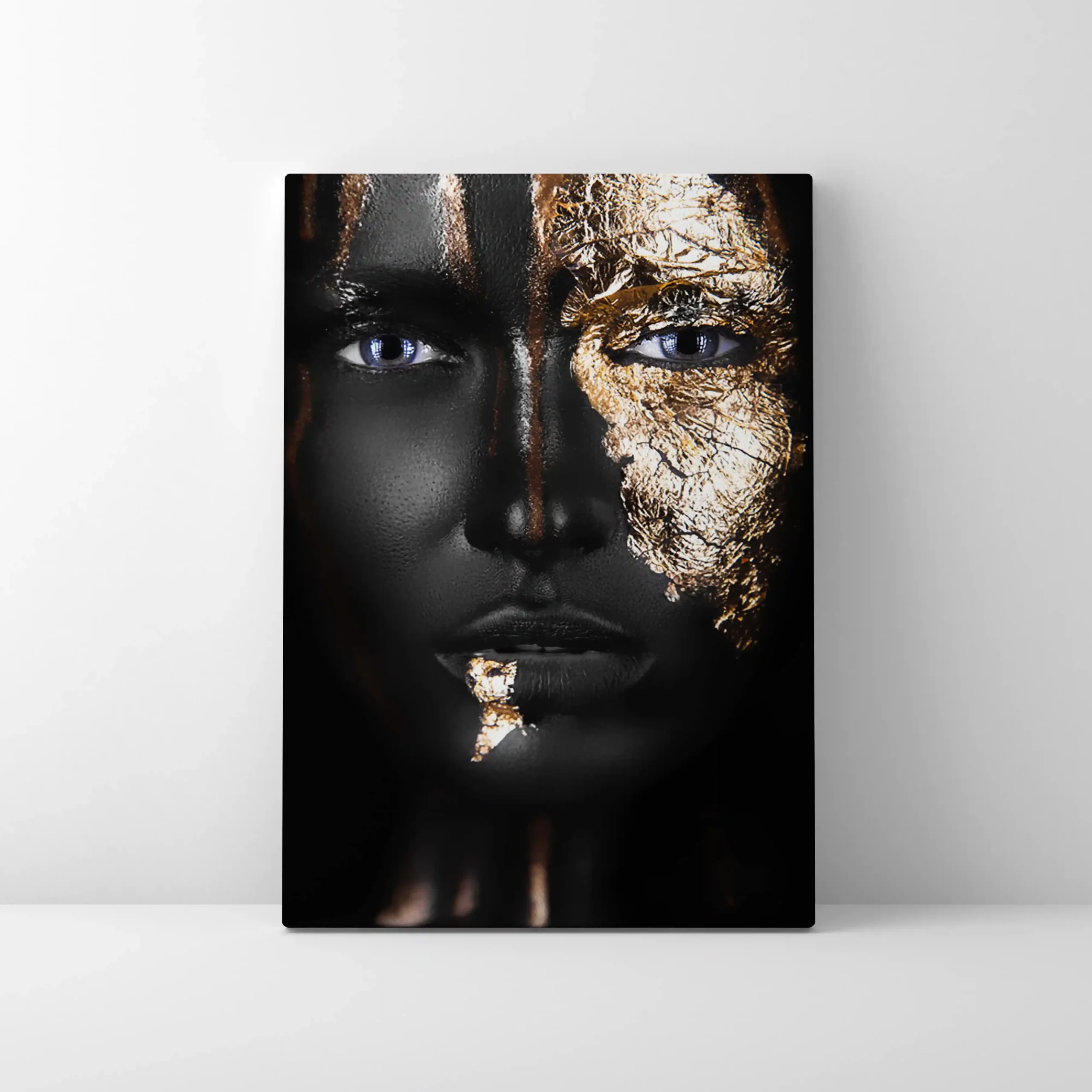 Abstract portrait of a woman with gold lips and nails.