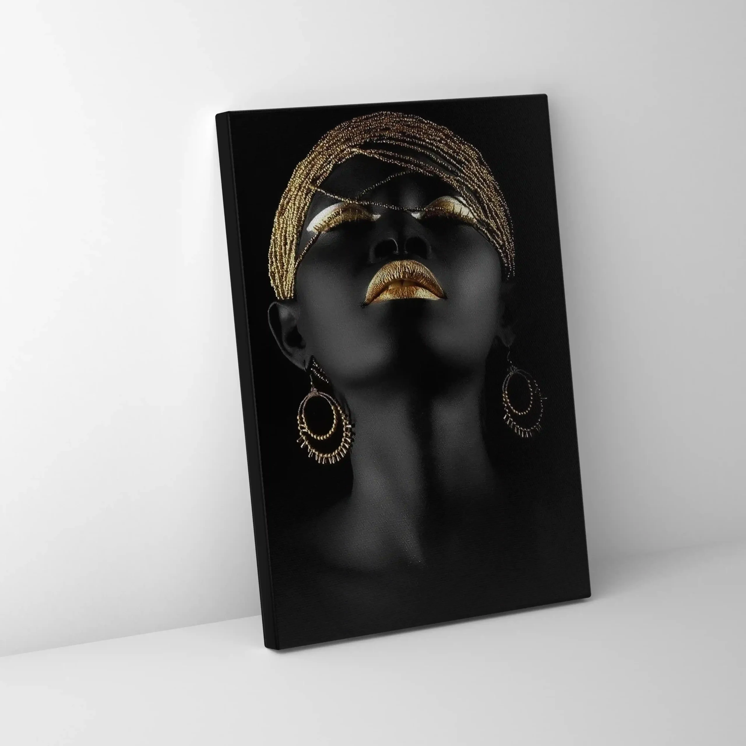 Abstract portrait of a woman with gold earrings and accents.