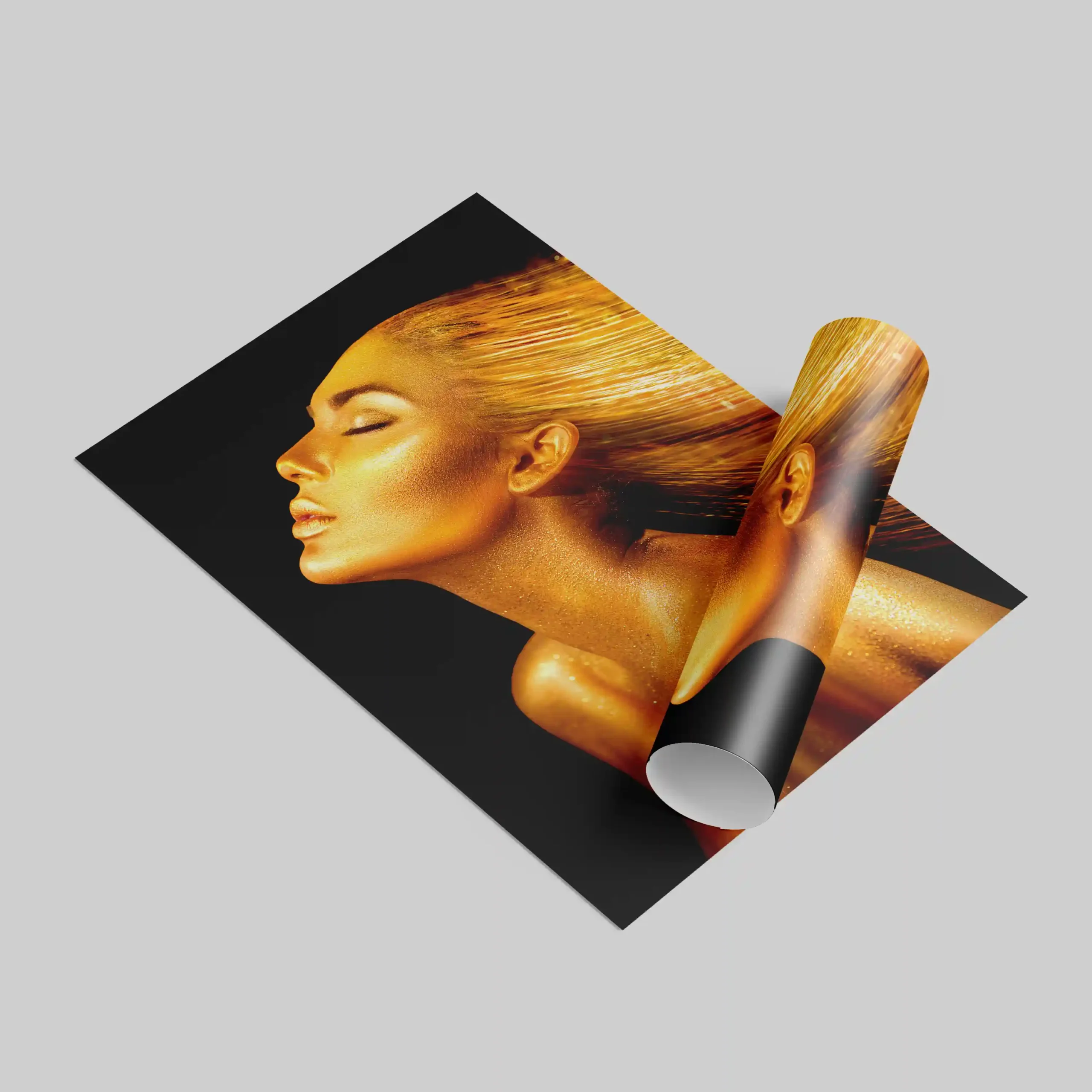 Abstract portrait of a woman with gold body paint and flowing hair.