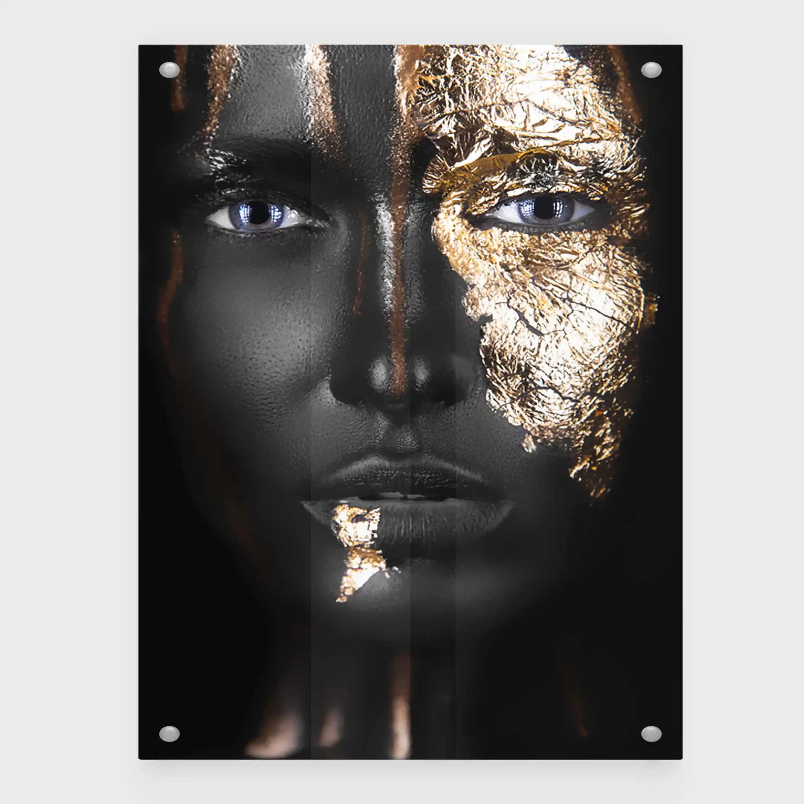 Abstract portrait of a woman with gold lips and nails.