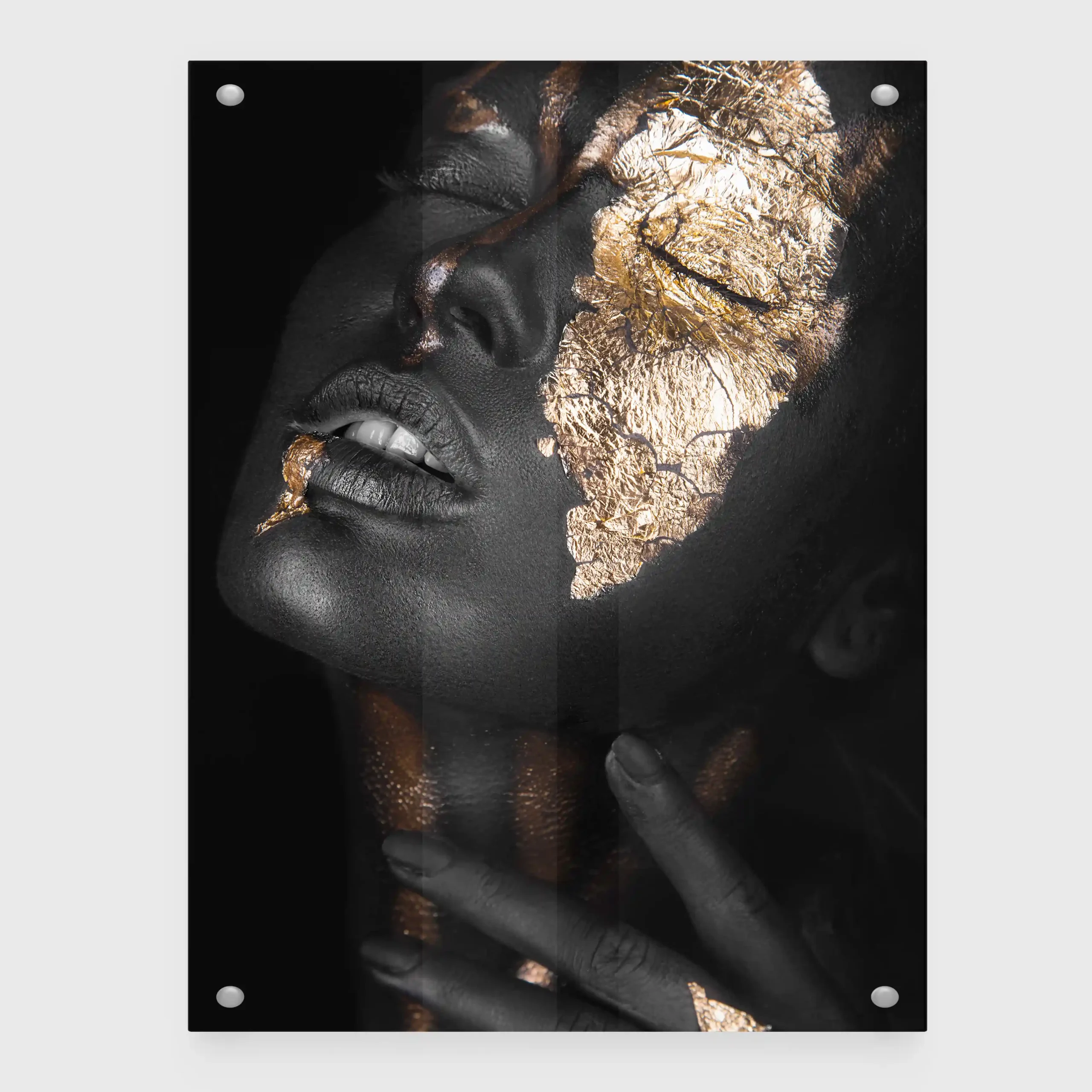 Abstract portrait of a woman with gold leaf accents.