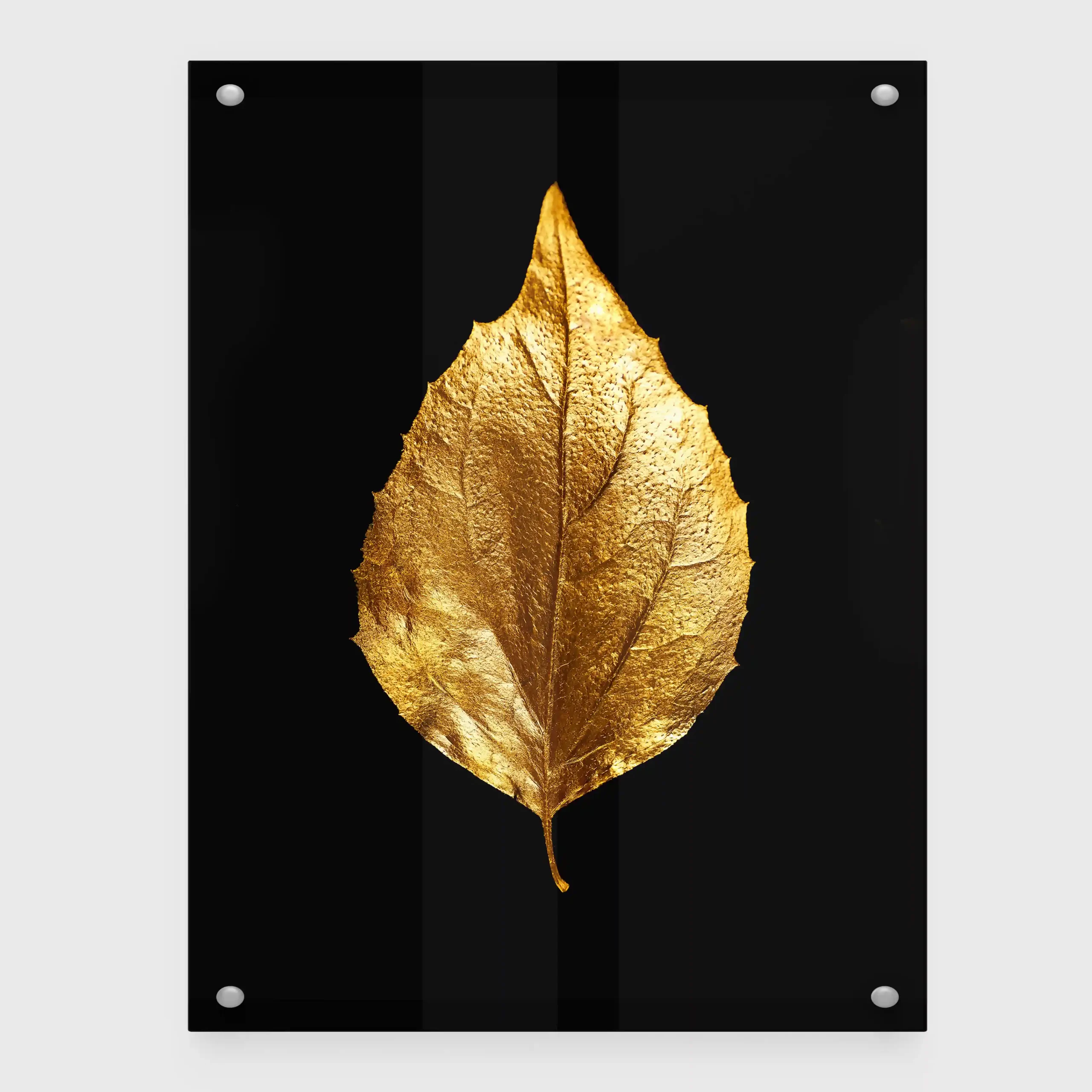 Abstract image of a gold leaf on a black background.